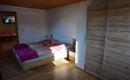 Bedroom in the Hanserhof with south-facing balcony.