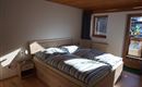 Bedroom in the Hanserhof with south-facing balcony.